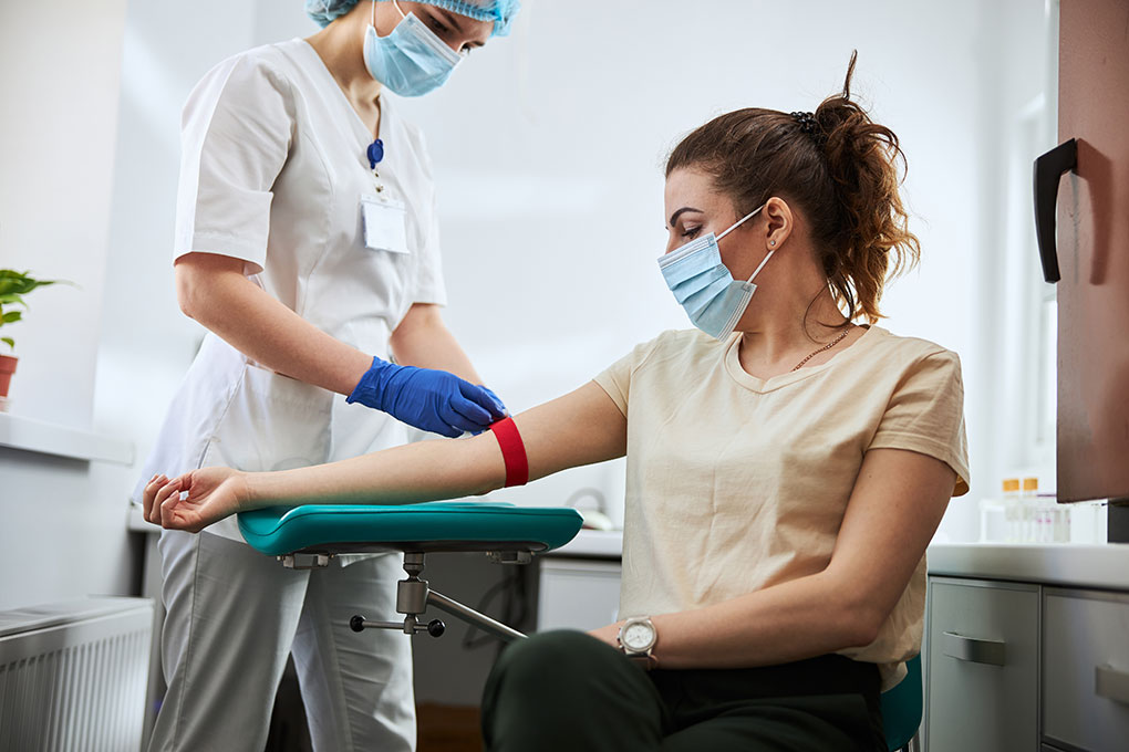 Woman getting her blood drawn