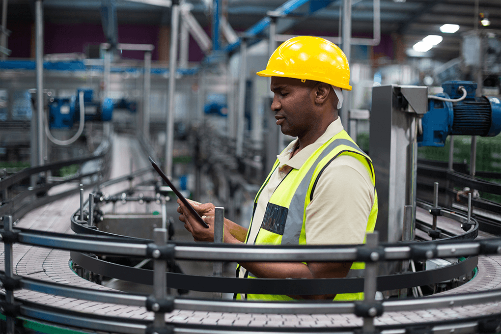 Man doing precision work on production line