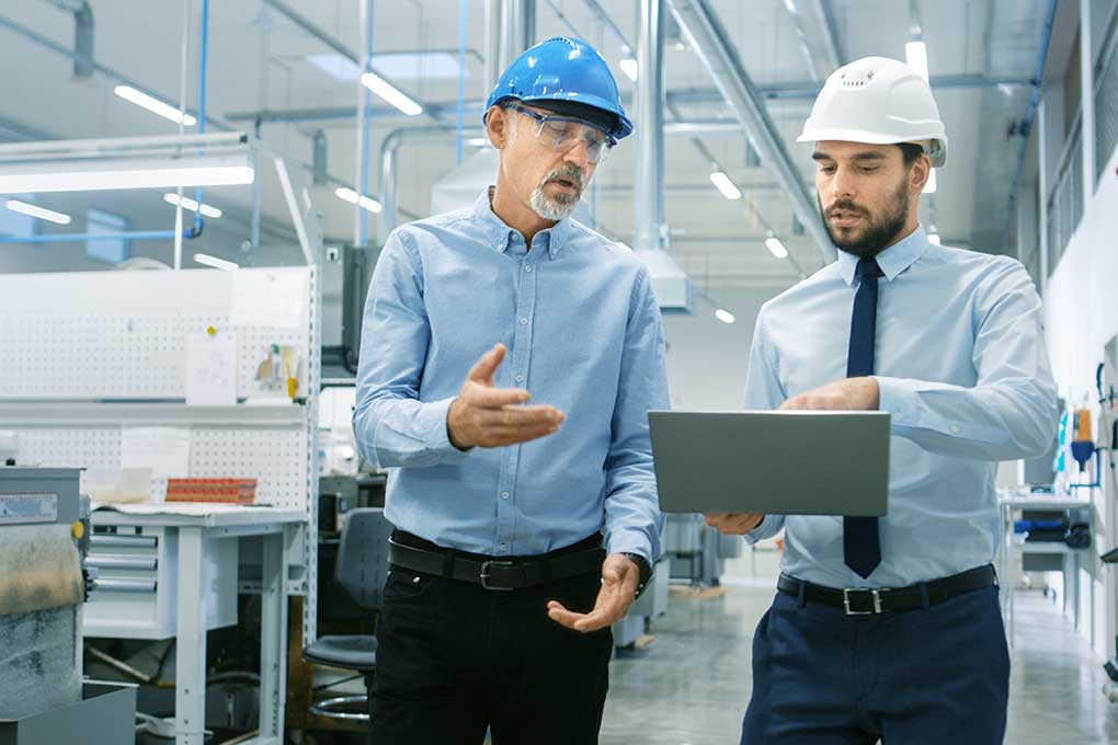 Discussing product details with chief engineer