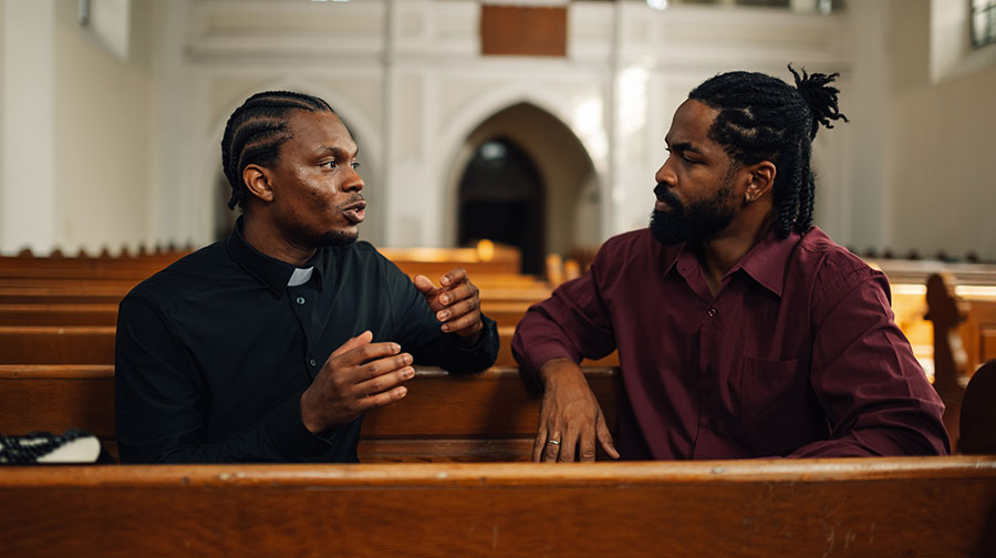 Priest providing guidance